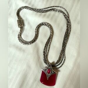 Premier Designs four strand silver chain necklace with pendant.